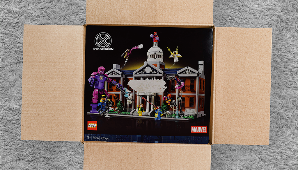 A second-hand boxed LEGO® set packed in a parcel box.png