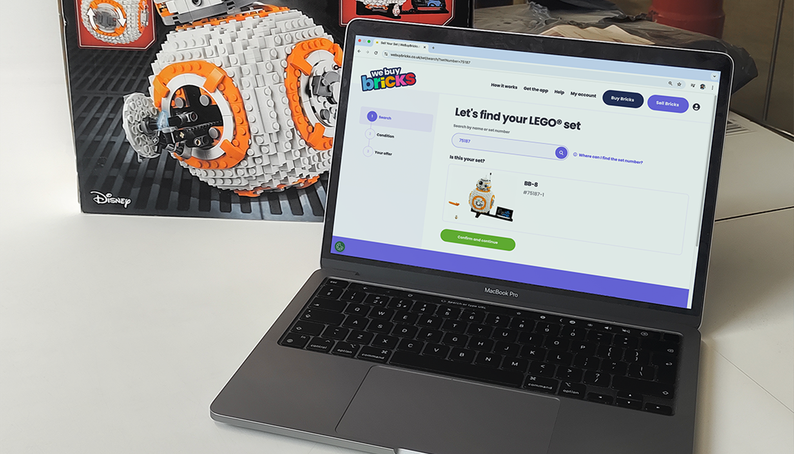 Image of a Star Wars™ LEGO® set next to a laptop with the WeBuyBricks website open.png