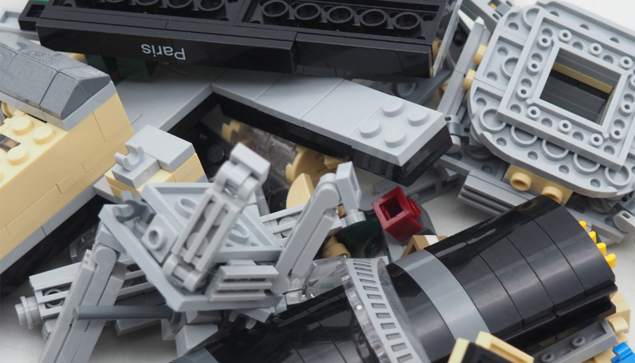 collection of grey and brown LEGO® pieces from the iconic LEGO® Architecture Sets.png