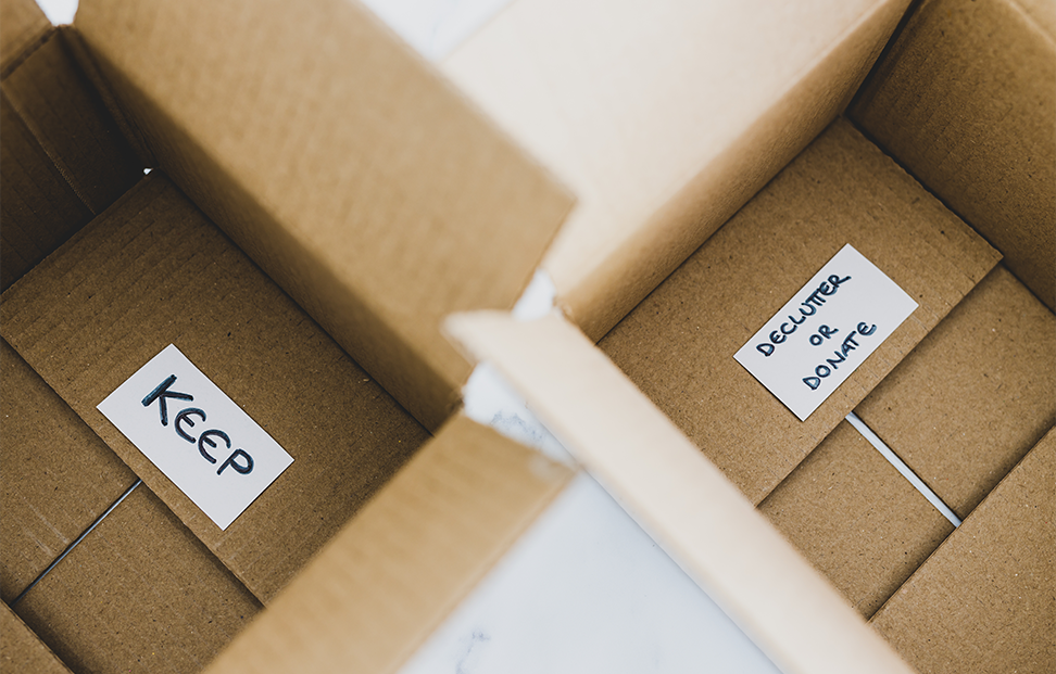 two empty boxes labelled 'keep' and 'declutter or donate'.png